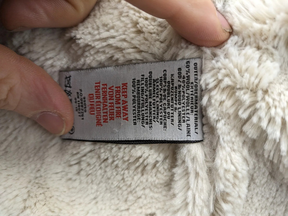 Johnnie B pink coat with gray check pattern, Sherpa lining, and zip closure.