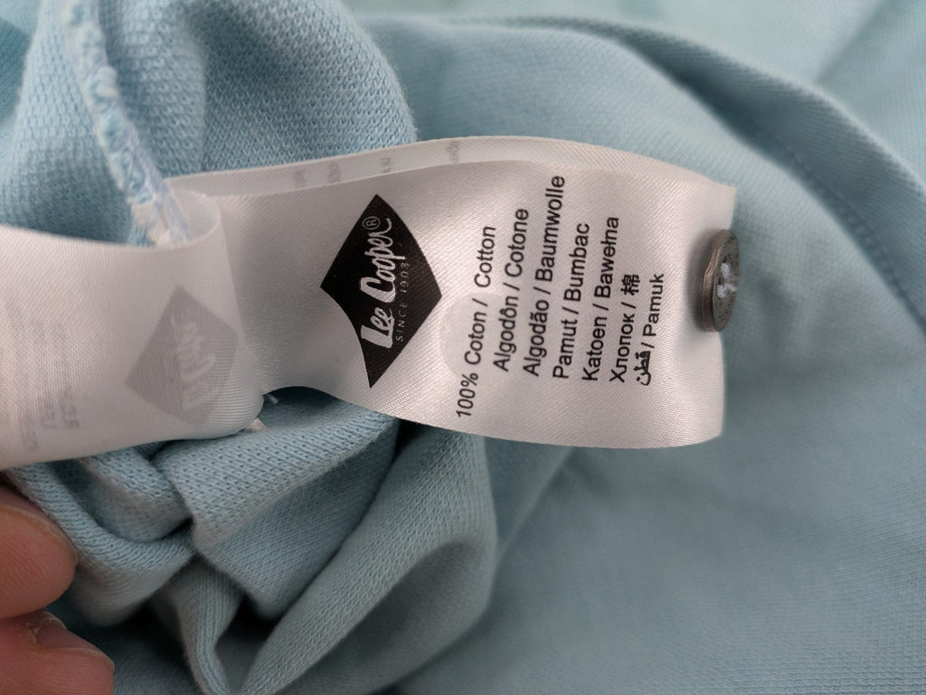 Lee Cooper blue polo shirt with embroidered logo and Union Jack patch on sleeve.
