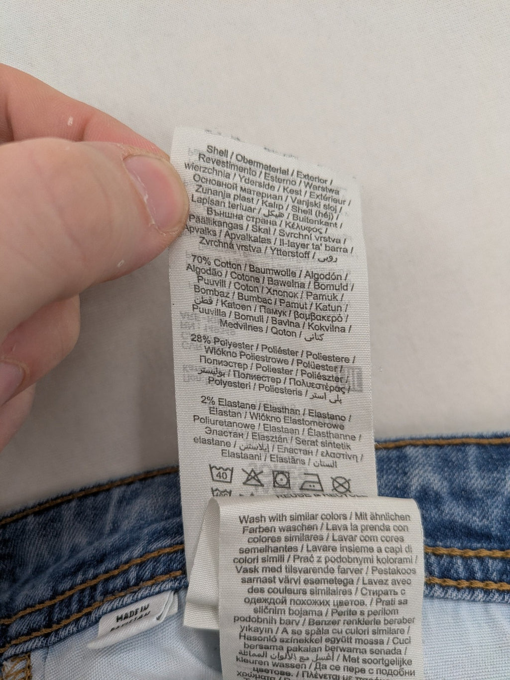 Jack & Jones blue slim jeans with button fly and subtle used look.