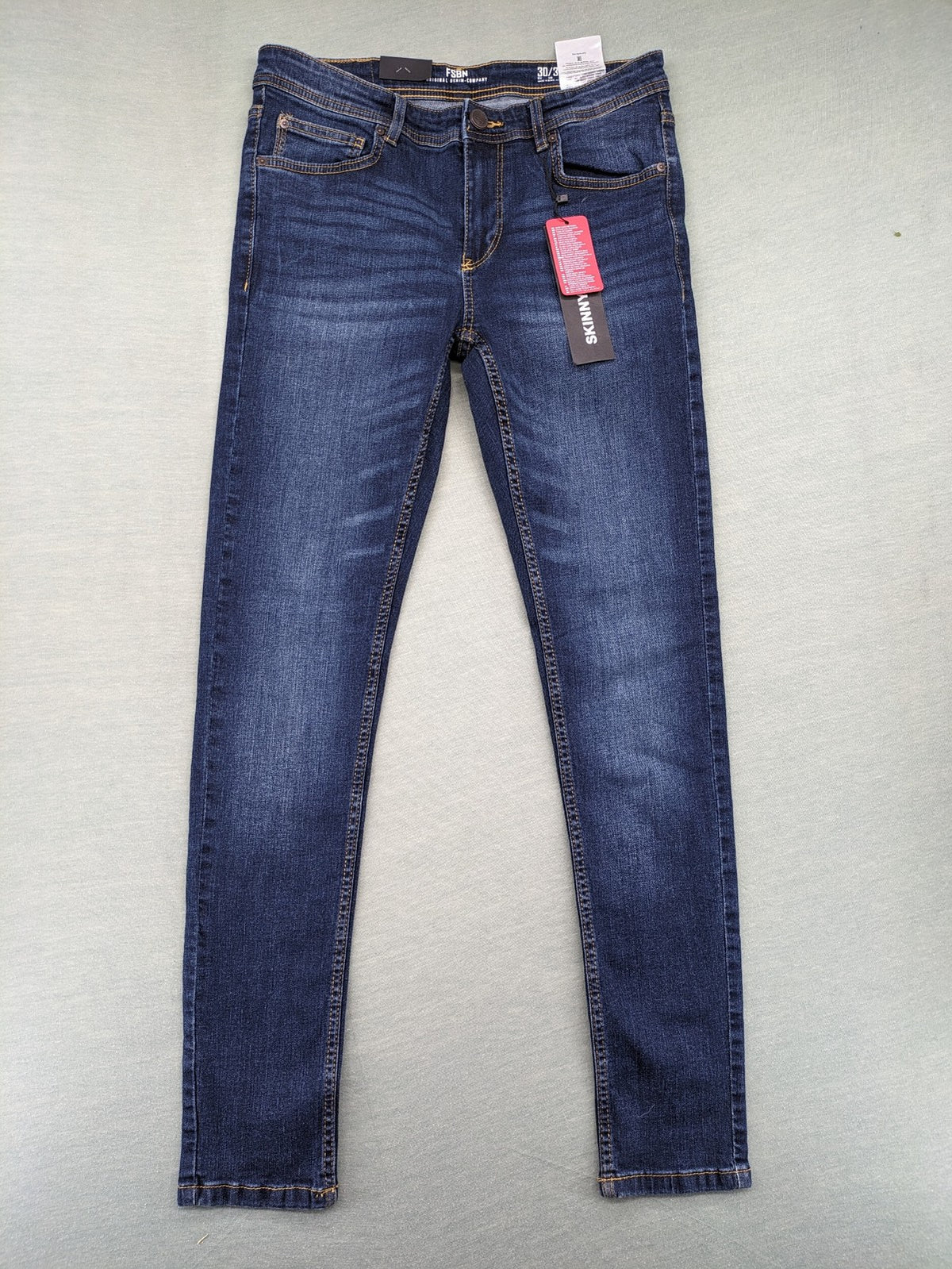 FSBN blue skinny jeans dark wash classic 5-pocket design with button closure