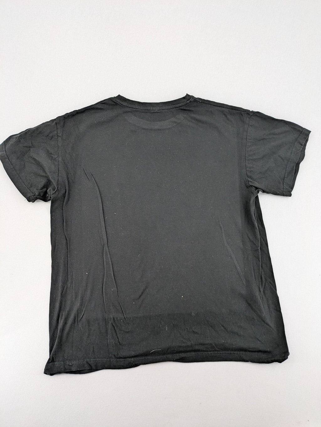 Dragon Ball Z black t-shirt featuring Goku Sport logo and silhouette on Flying Nimbus.