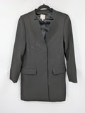 H&M pink long blazer kragenlos design with open front and two front pockets.