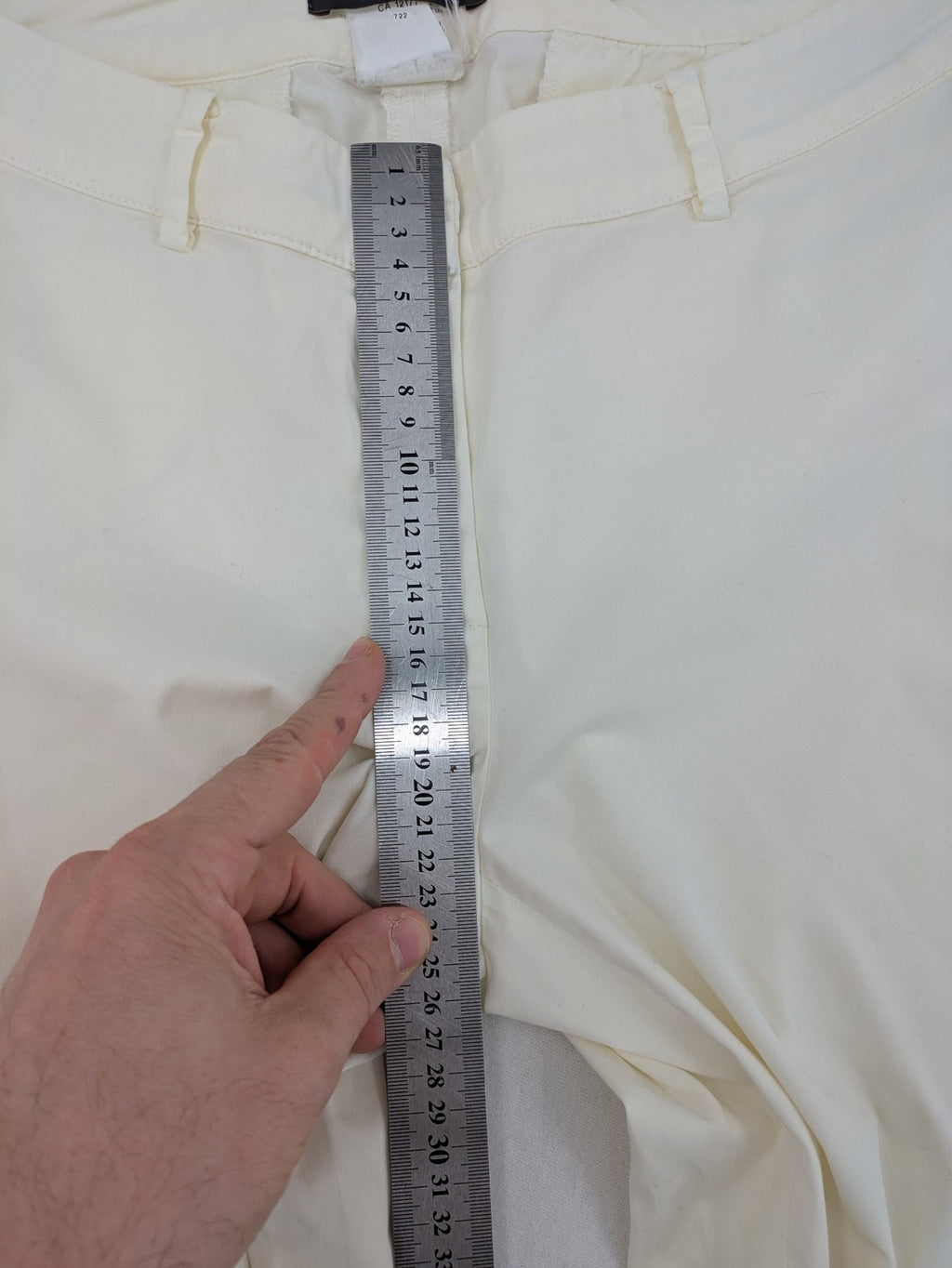 MaxMara cream cropped chino pants with zipper closure, belt loops, and back pockets.