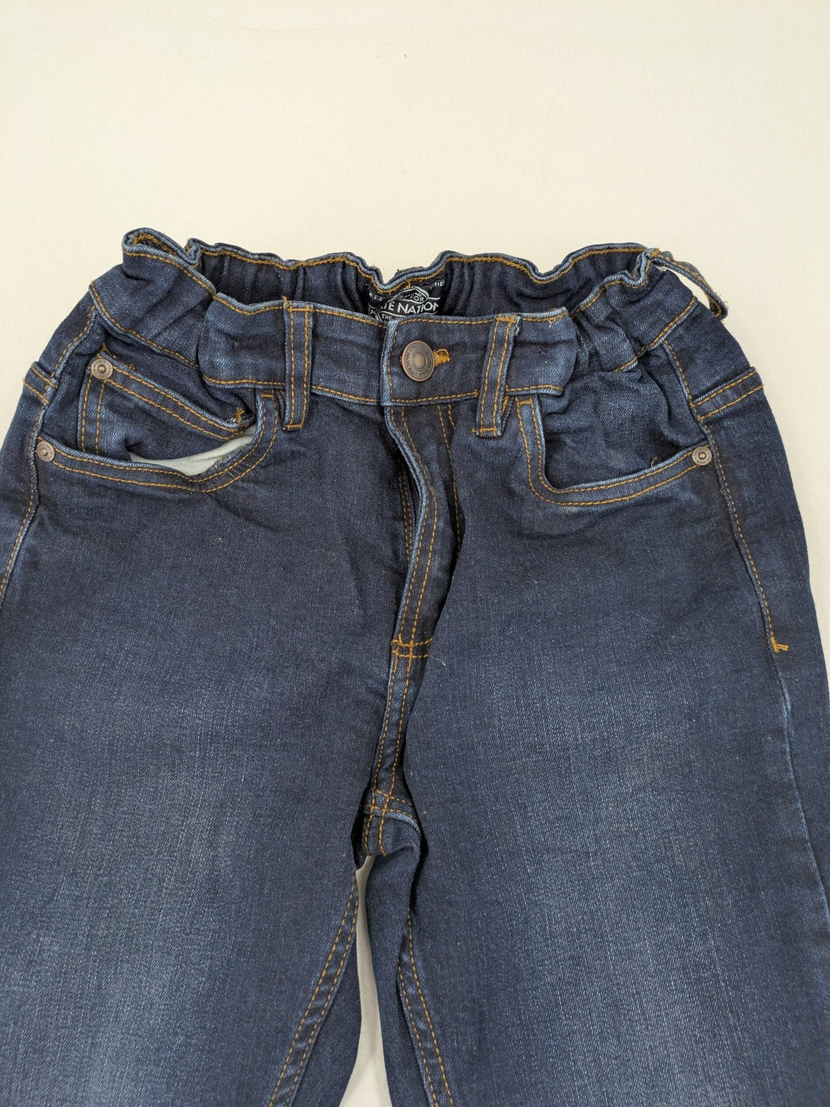 Skate Nation blue straight jeans 5-pocket design with adjustable waistband and dark wash.