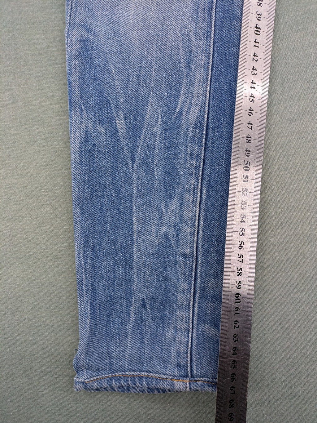 G-Star Raw blue slim skinny jeans with light wash and signature back zip pocket.