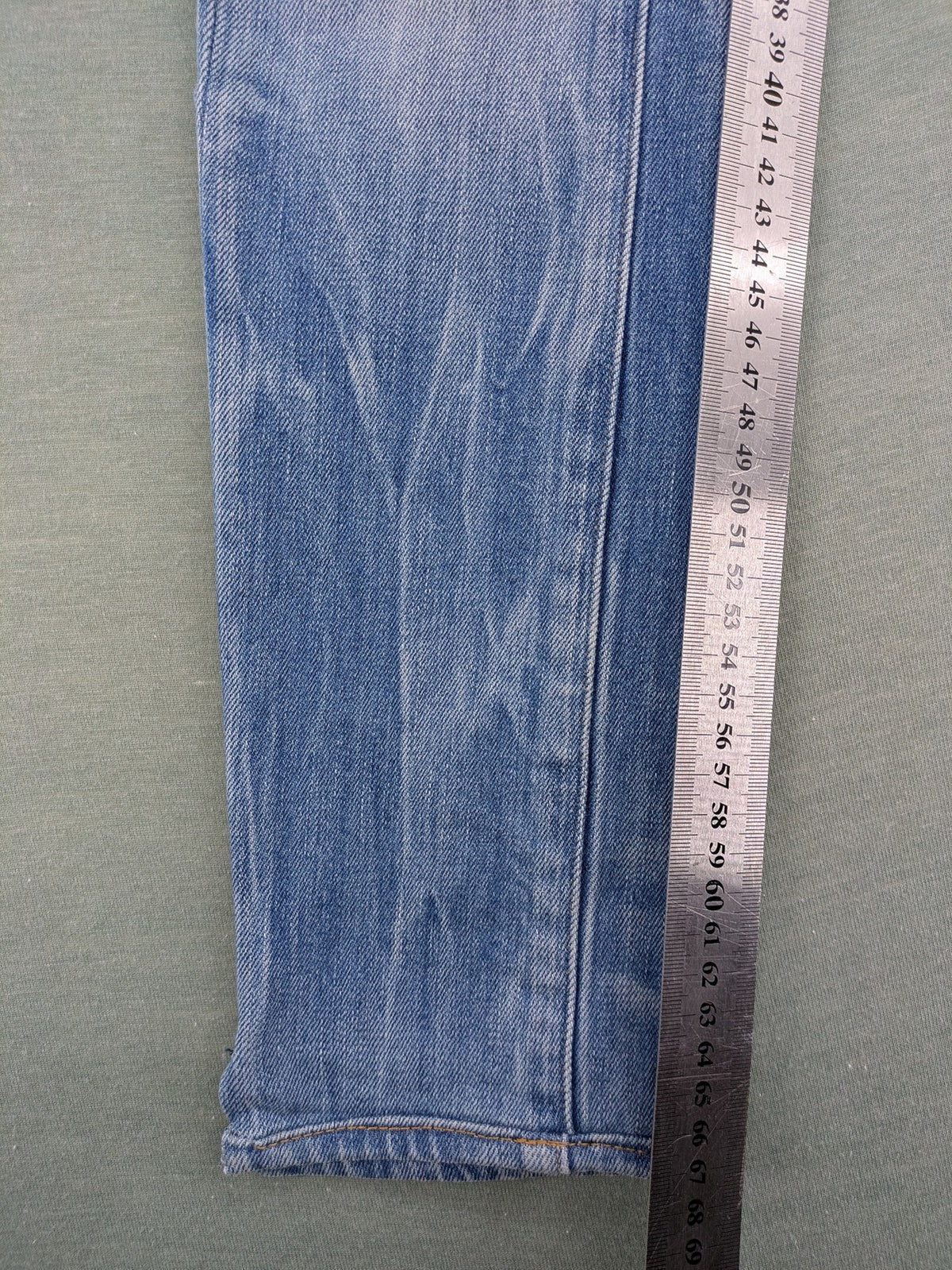 G-Star Raw blue slim skinny jeans with light wash and signature back zip pocket.