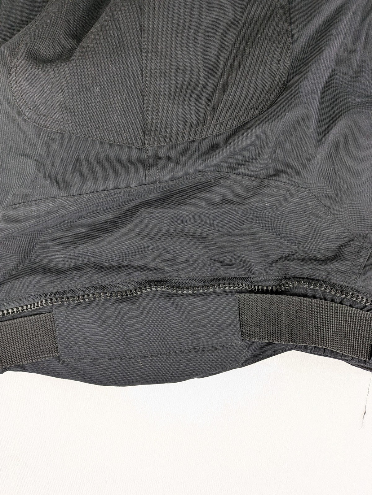 iXS black chaps with grey accents, waterproof textile, adjustable belt, reinforced knees.