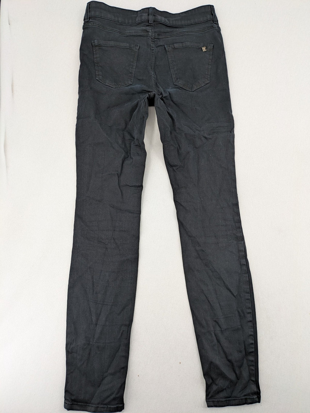 Massimo Dutti grey skinny fit jeans with coated finish and sleek silhouette.