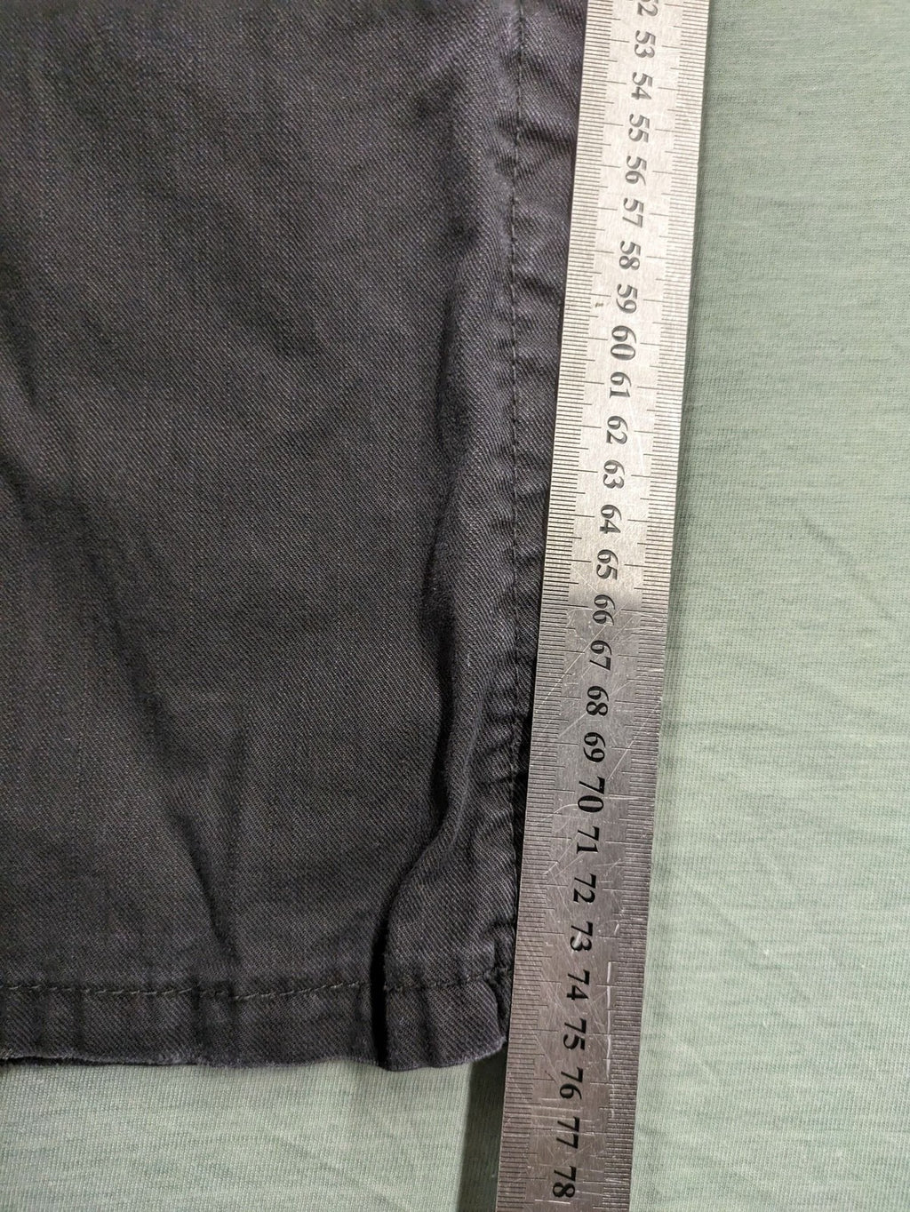 Savvy black pants straight fit with button fly, embroidered details and unique stitching.