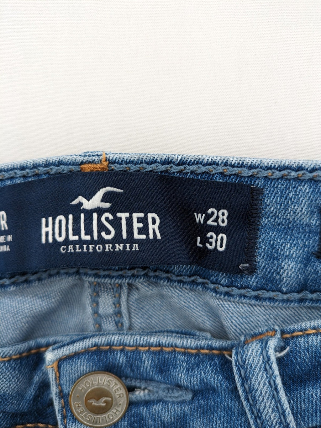 Hollister blue high rise super skinny jeans with frayed hem and classic stretch denim.