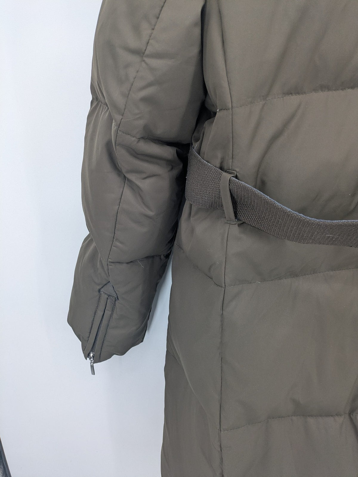 Yessica khaki puffer coat long quilted design with belt, zip pockets, and hood.