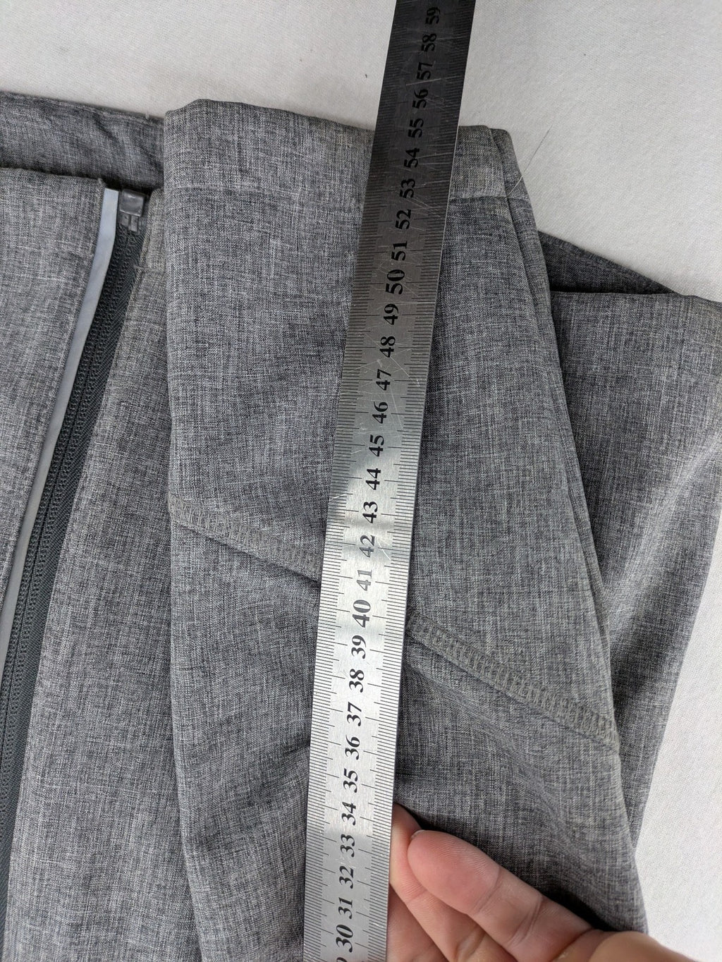 Northville grey and red softshell jacket with hood, fleece lining, and reflective elements.