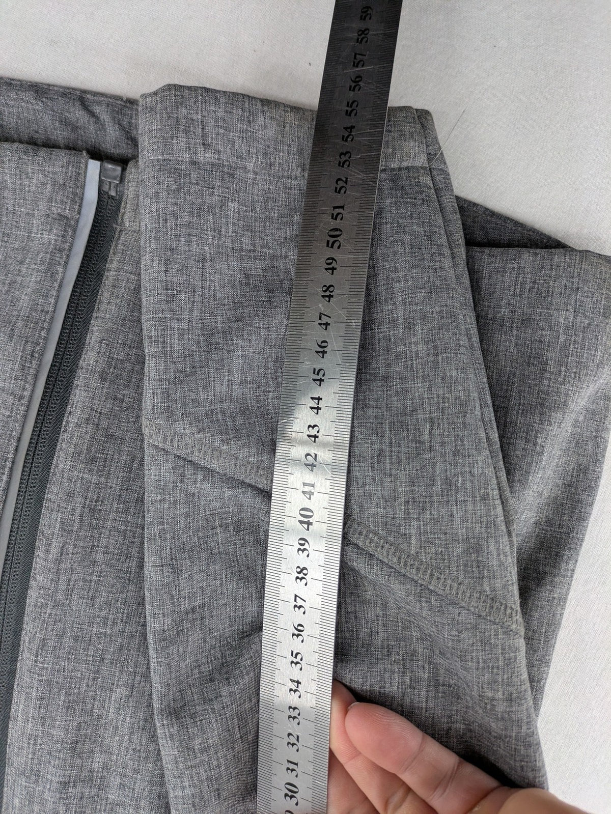 Northville grey and red softshell jacket with hood, fleece lining, and reflective elements.