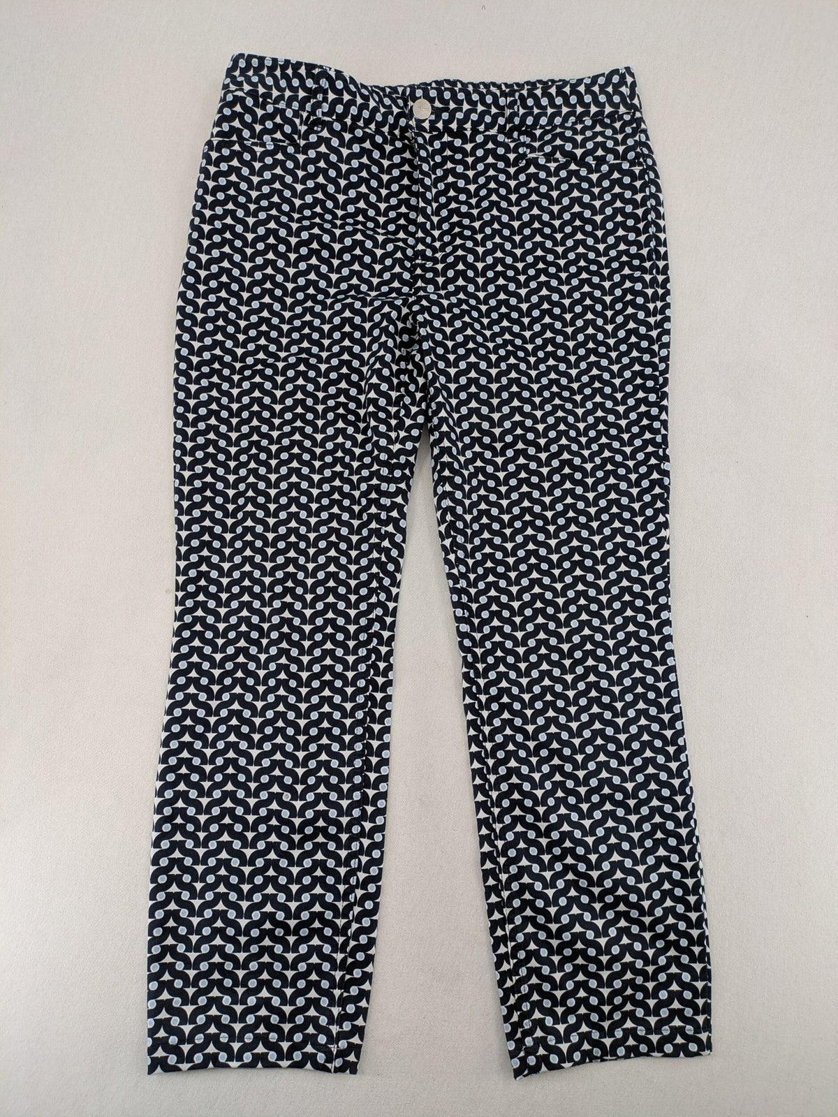 Bonita navy pants with geometric pattern, stretch material, and classic zip fly closure.