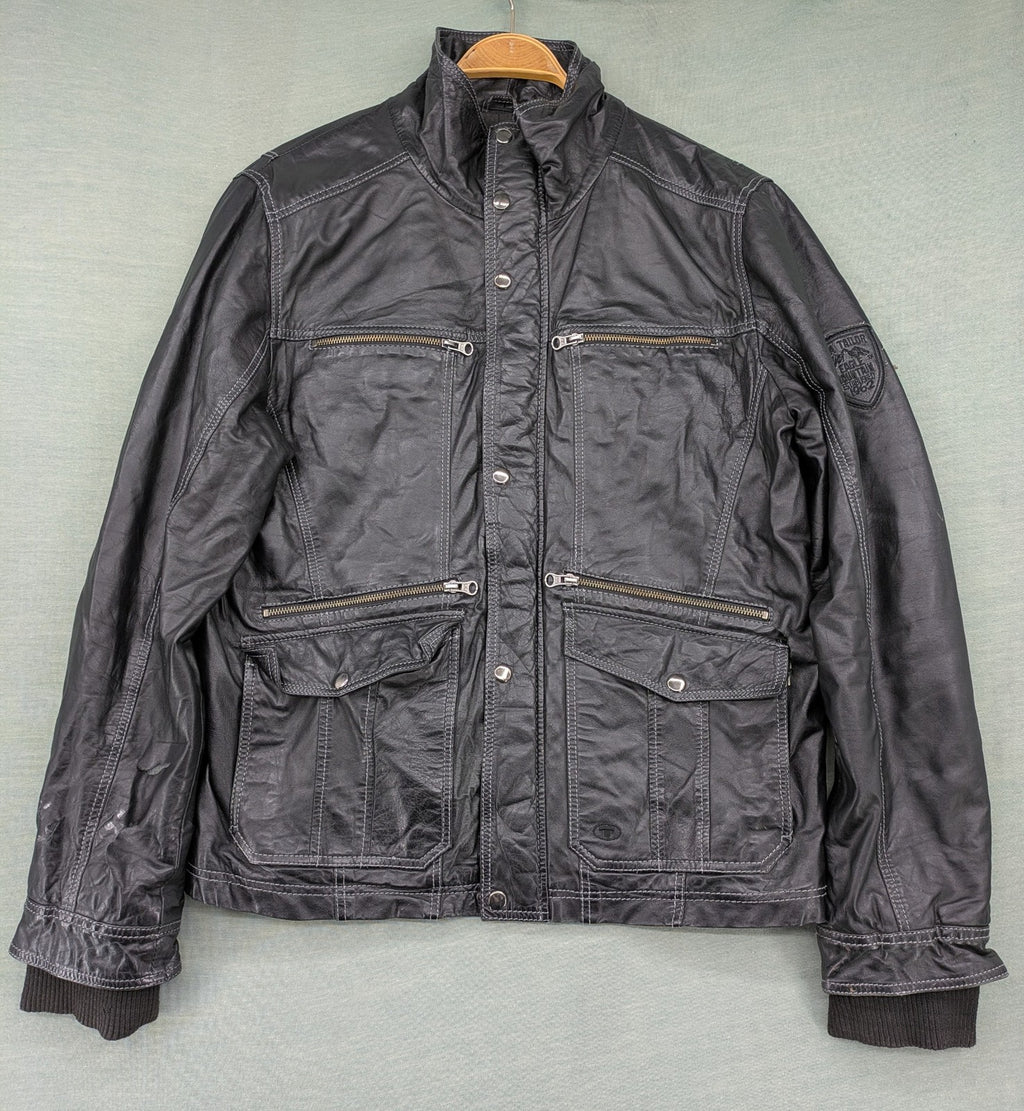 Tom Tailor black leather jacket vintage style with multiple pockets and contrast stitching.