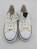 Disney Mickey Mouse white canvas low top sneakers with iconic Mickey Mouse graphic.