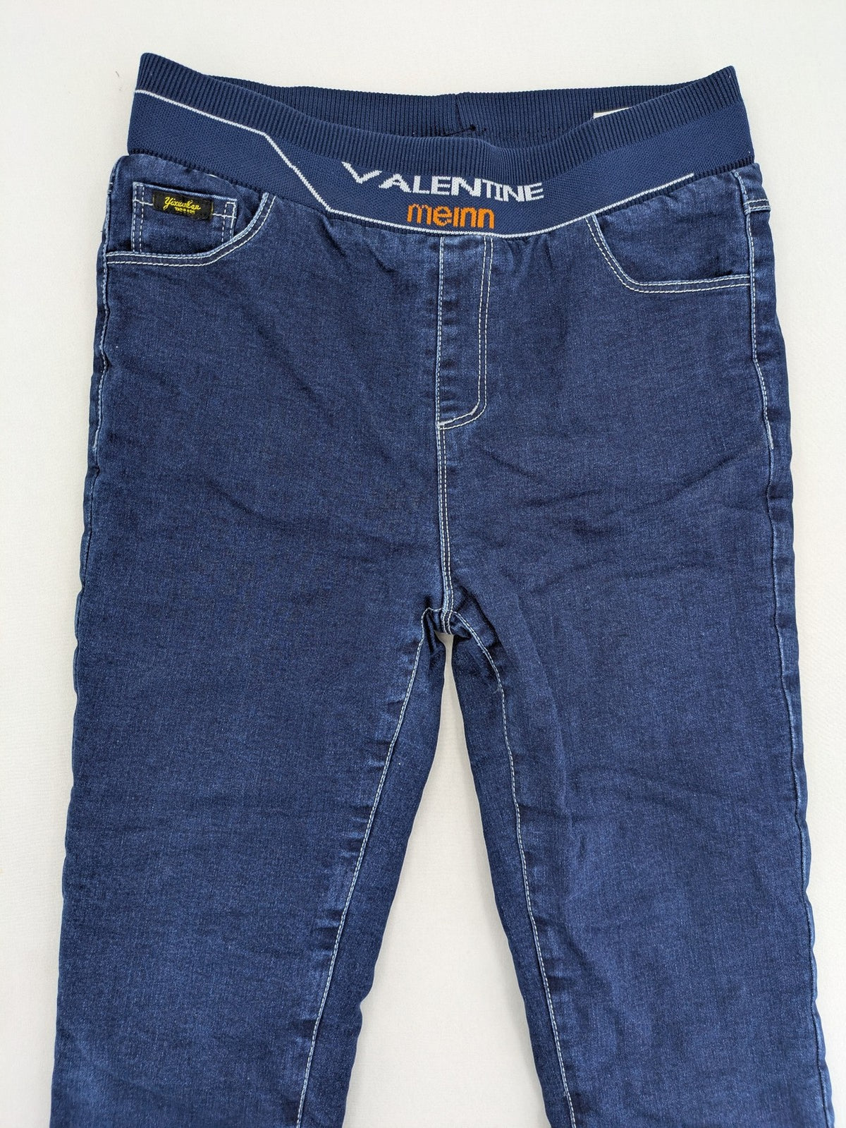 Valentine Meinn blue straight jeans with elastic waistband and soft lining, classic denim look.