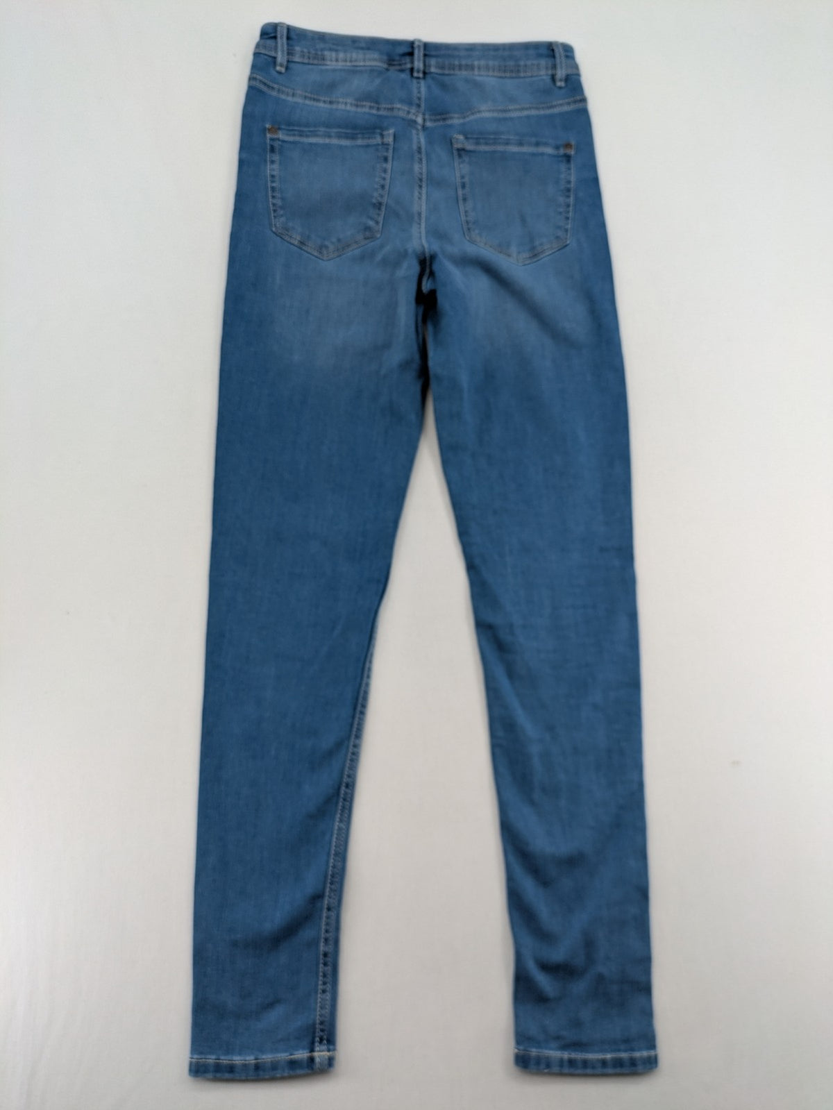 ESMARA blue super skinny jeans with medium waist and stretchy cotton blend material.