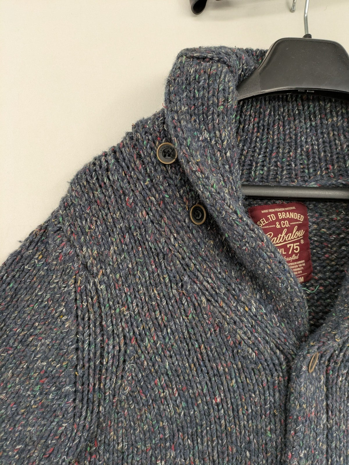 Catbalou multi turtle neck jumper with classic shawl collar and button closure.