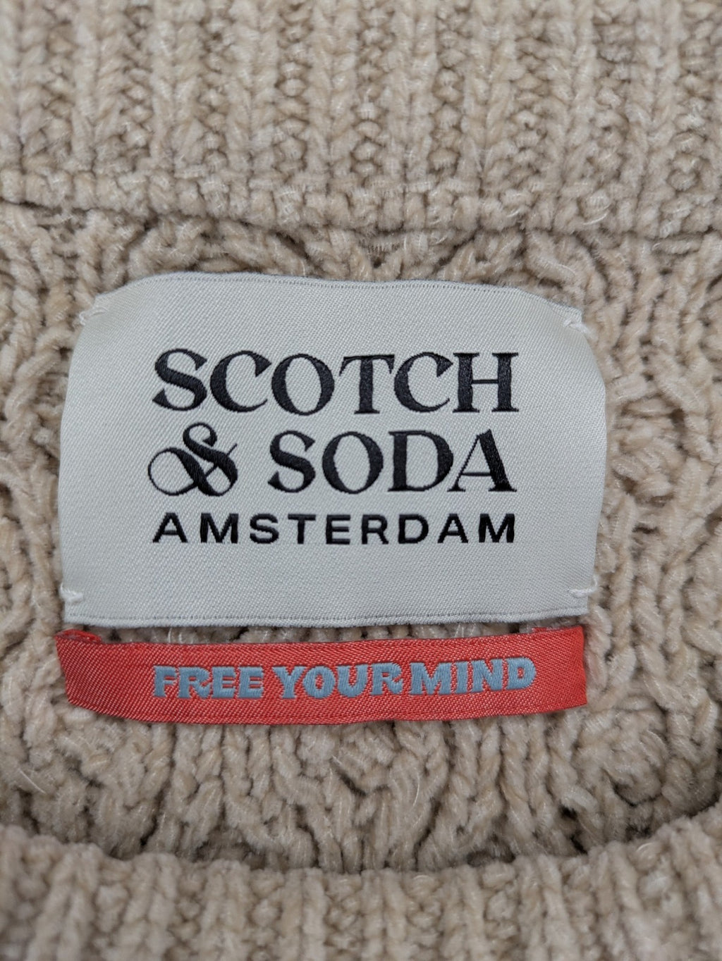 Scotch & Soda beige turtle neck jumper with intricate cable knit pattern.