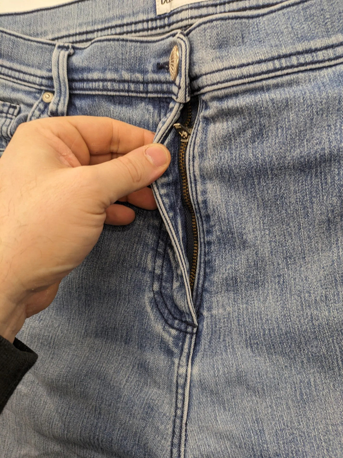Angels blue straight jeans with five-pocket design and vertical front seams.