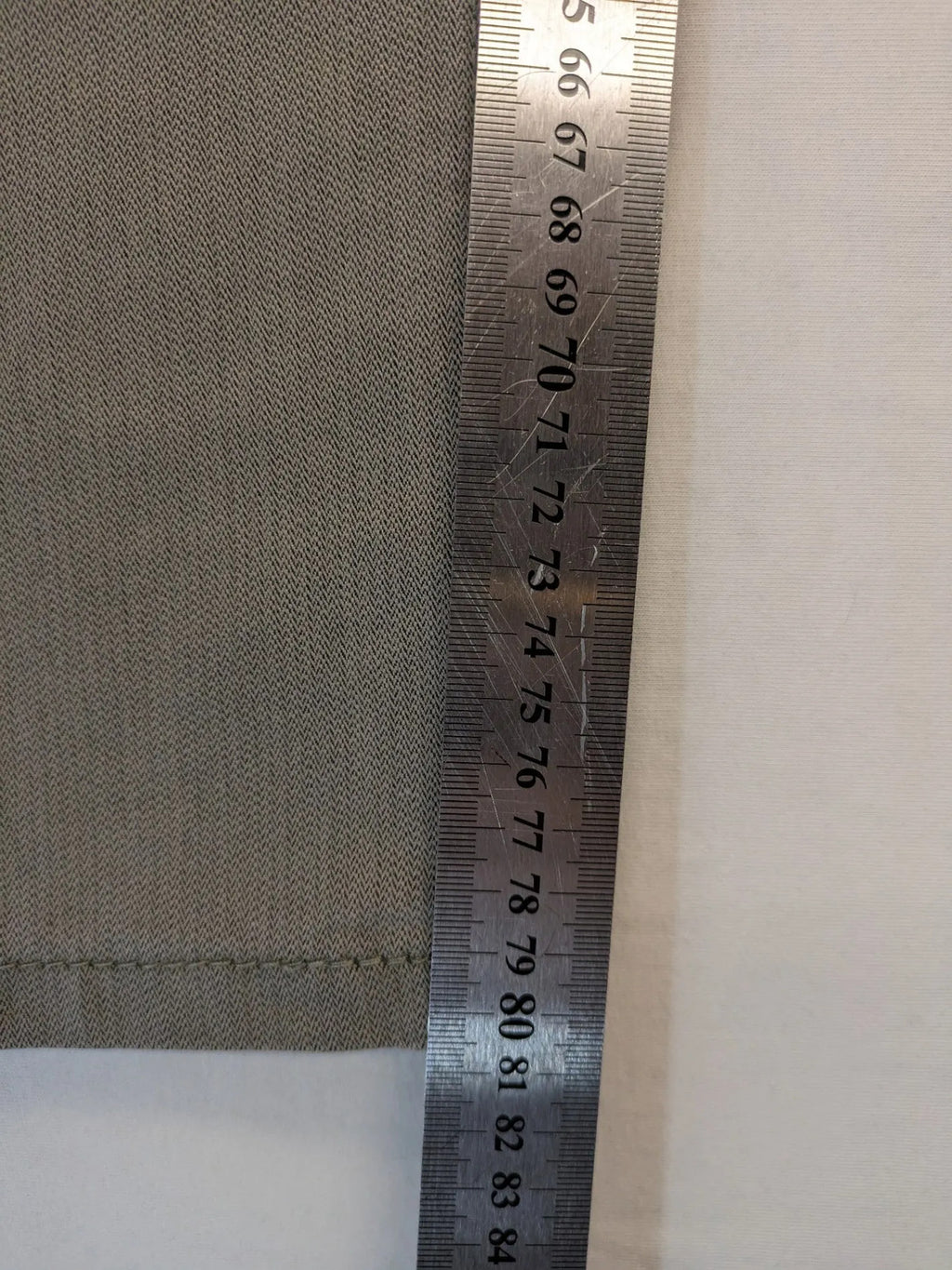 BRAX grey straight jeans 5-pocket design with zipper fly and soft fabric.
