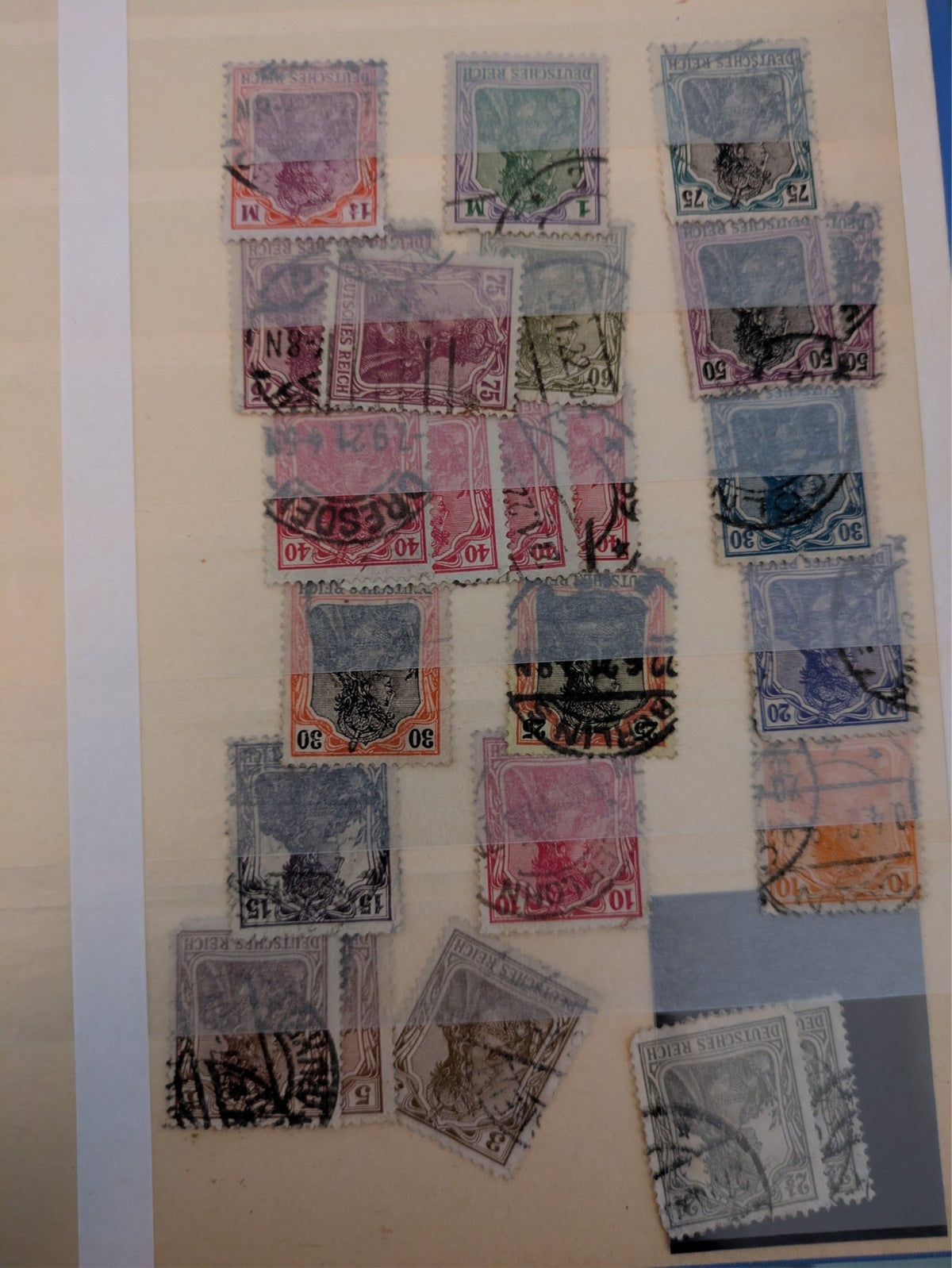 Beige postage stamp album featuring over 1000 stamps from Germany and Europe.