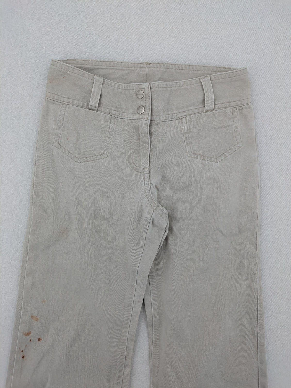 H&M L.O.G.G beige bootcut pants with double button closure and stretch cotton material.