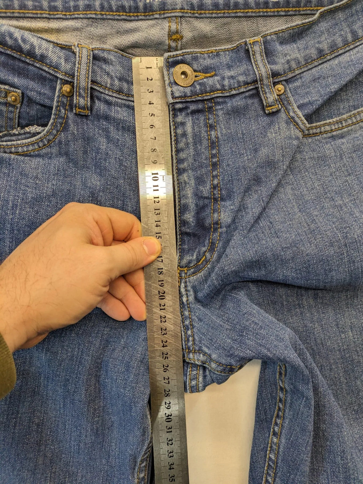 Hero By John Meddox blue straight jeans with five-pocket design and zip fly.
