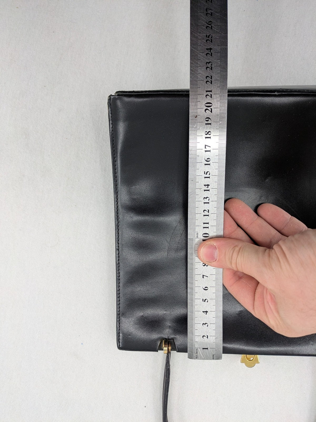 Eleganz black messenger bag vintage 50s 60s style with structured shape and gold accents.