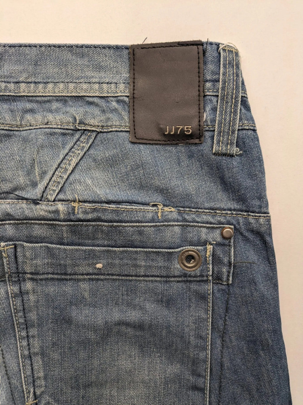 Jack & Jones blue straight jeans with biker panel details and button-fly closure.