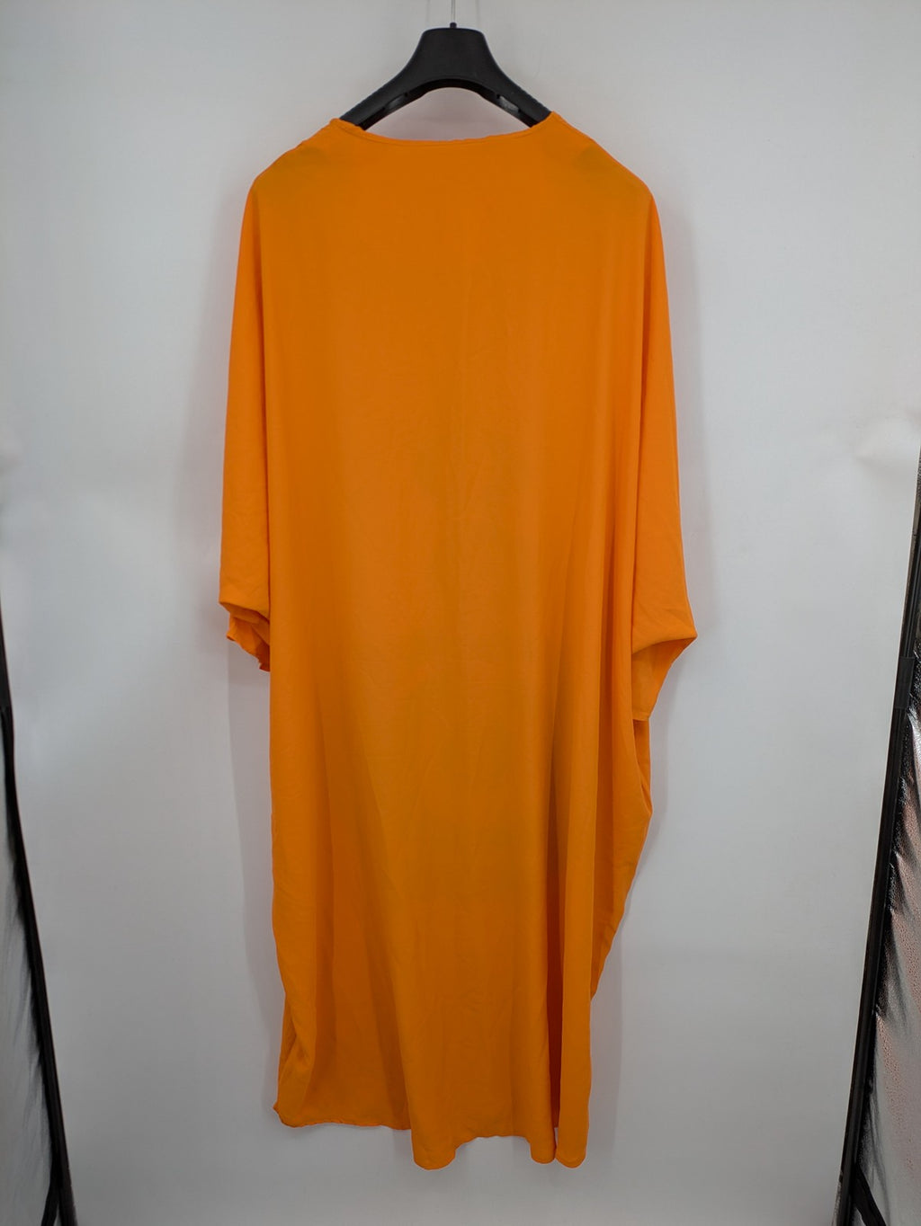 Kaftan orange oversized summer dress with unique graphic print and long sleeves.