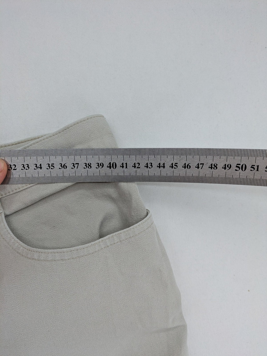 Vunic beige chinos with straight leg, 5-pocket design, and classic front zipper closure.