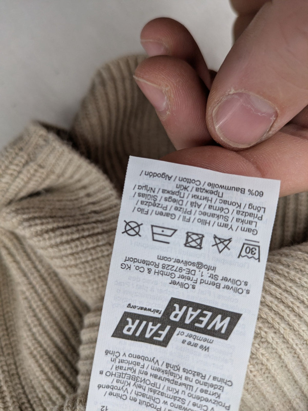 s.Oliver beige turtle neck jumper with V-neck, ribbed texture, and raglan sleeves