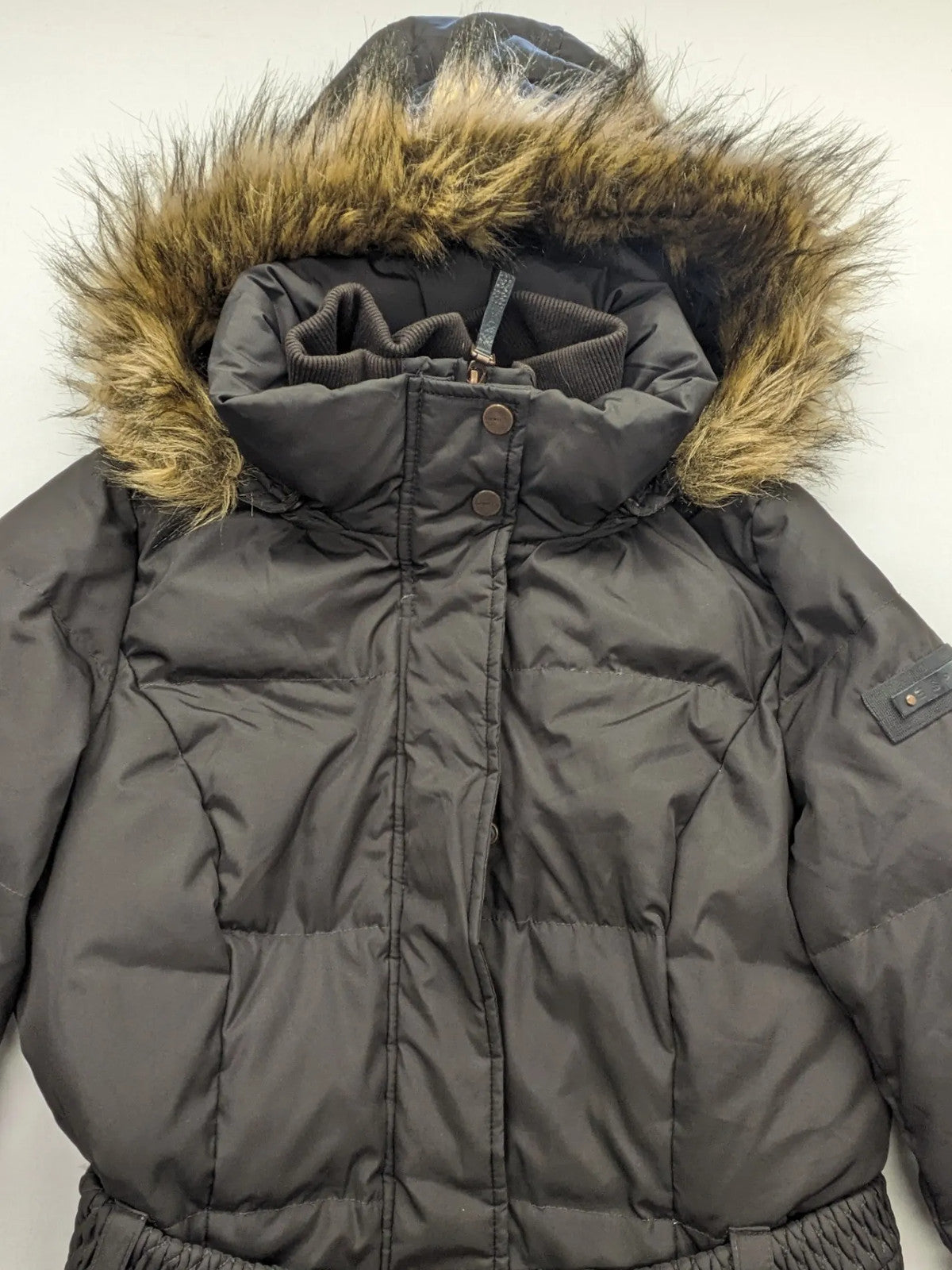 Esprit black quilted coat with removable faux fur hood and elastic waist belt.