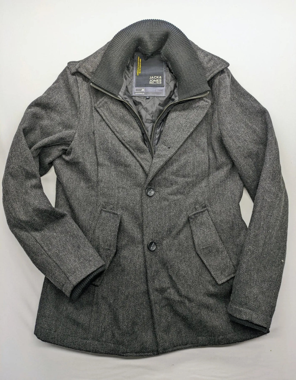 Jack & Jones grey coat herringbone pattern with two-button closure and side pockets.