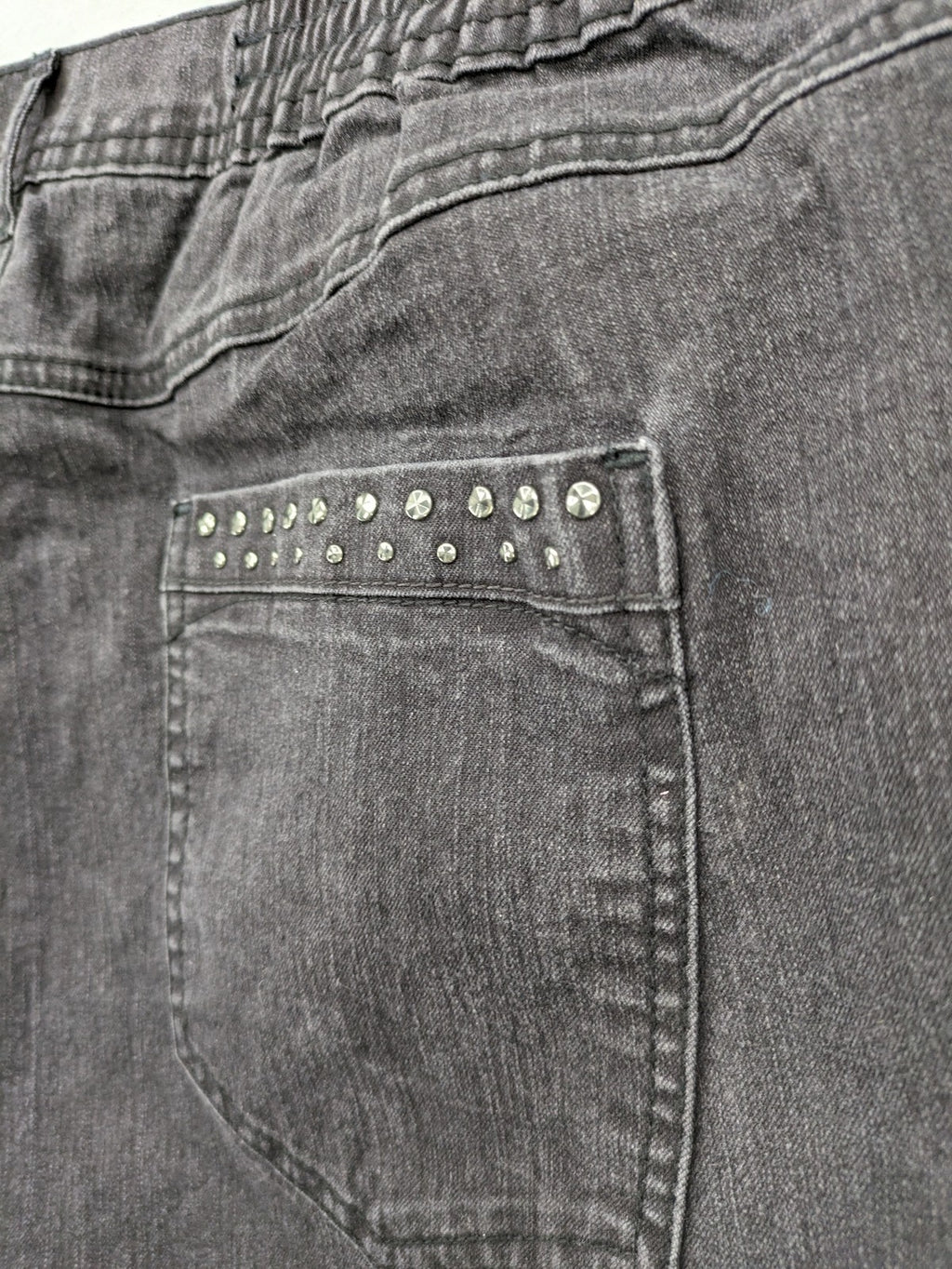Charles Vögele grey straight jeans with elastic waistband and decorative studs on pockets.