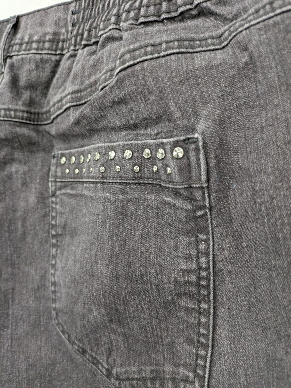 Charles Vögele grey straight jeans with elastic waistband and decorative studs on pockets.