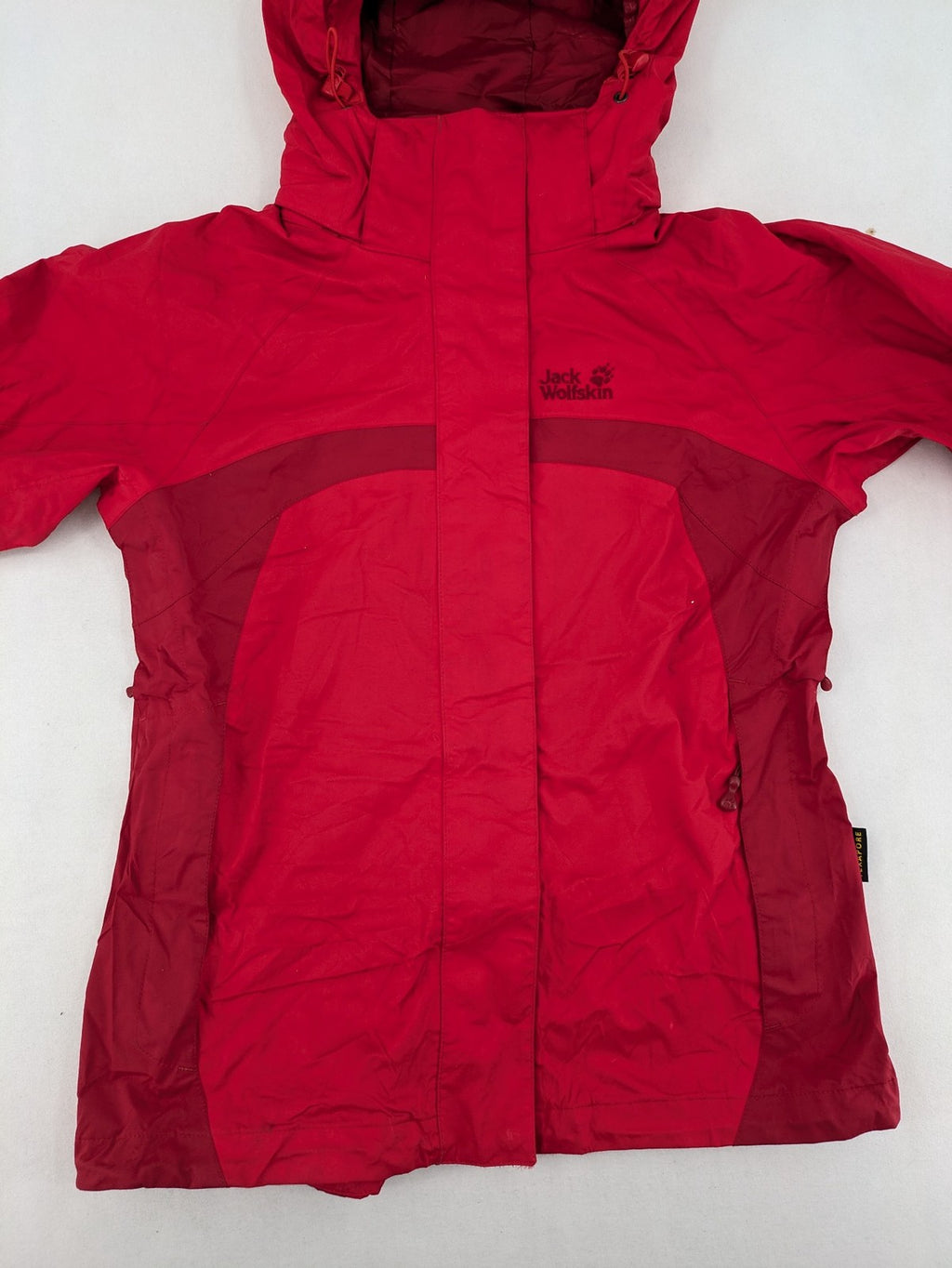 Jack Wolfskin red outdoor jacket with adjustable hood and Texapore waterproof technology