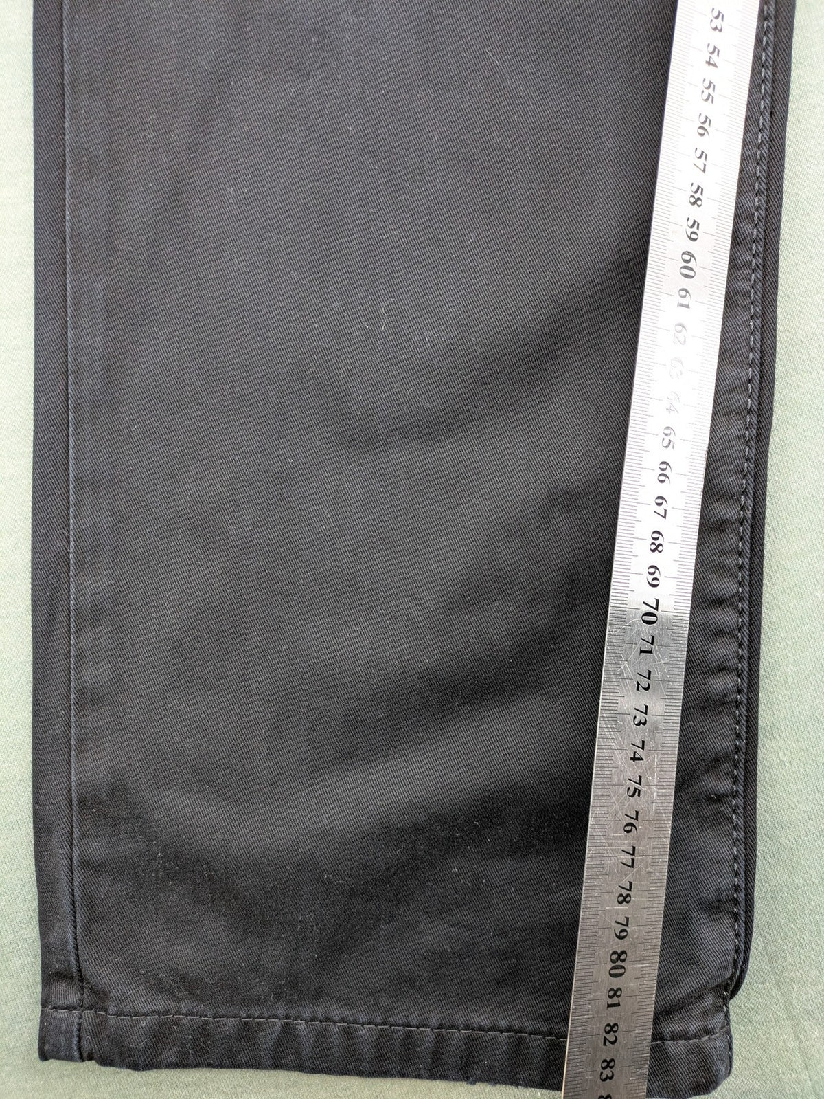 Joker black straight jeans five-pocket design with prominent stitching and brand details.