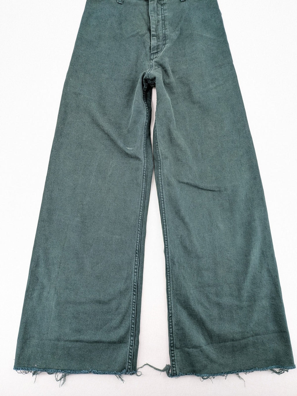 Zara green high waist wide leg jeans with frayed hem and button closure.