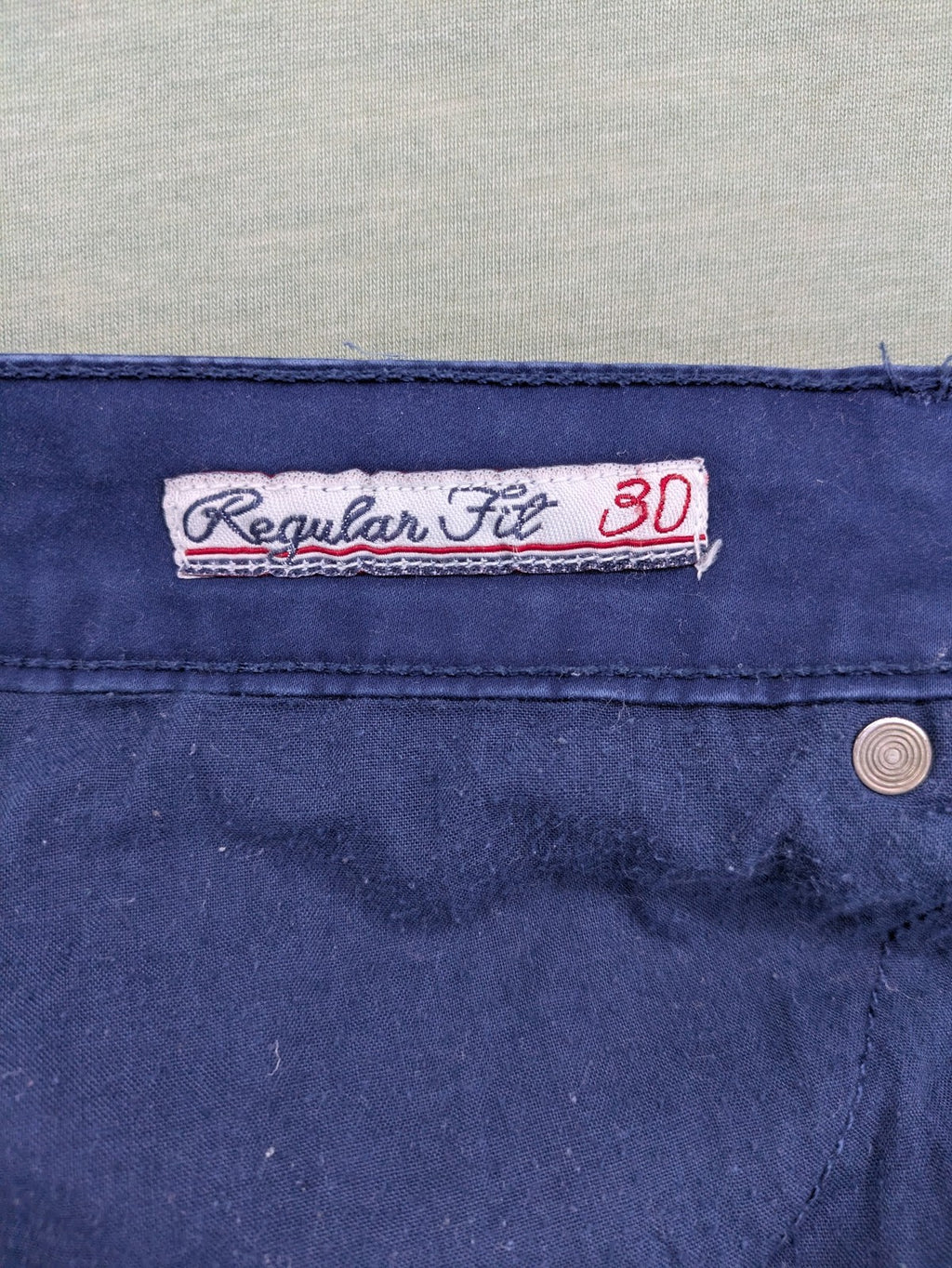 U.S. Polo Assn. navy chino pants classic 5-pocket design with subtle logo stitching