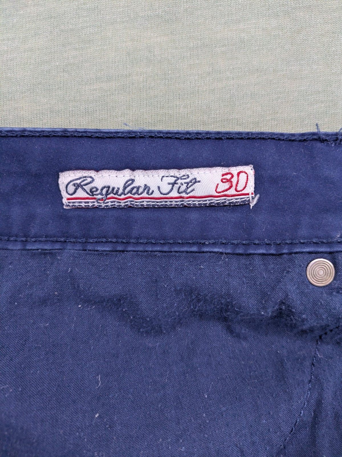 U.S. Polo Assn. navy chino pants classic 5-pocket design with subtle logo stitching