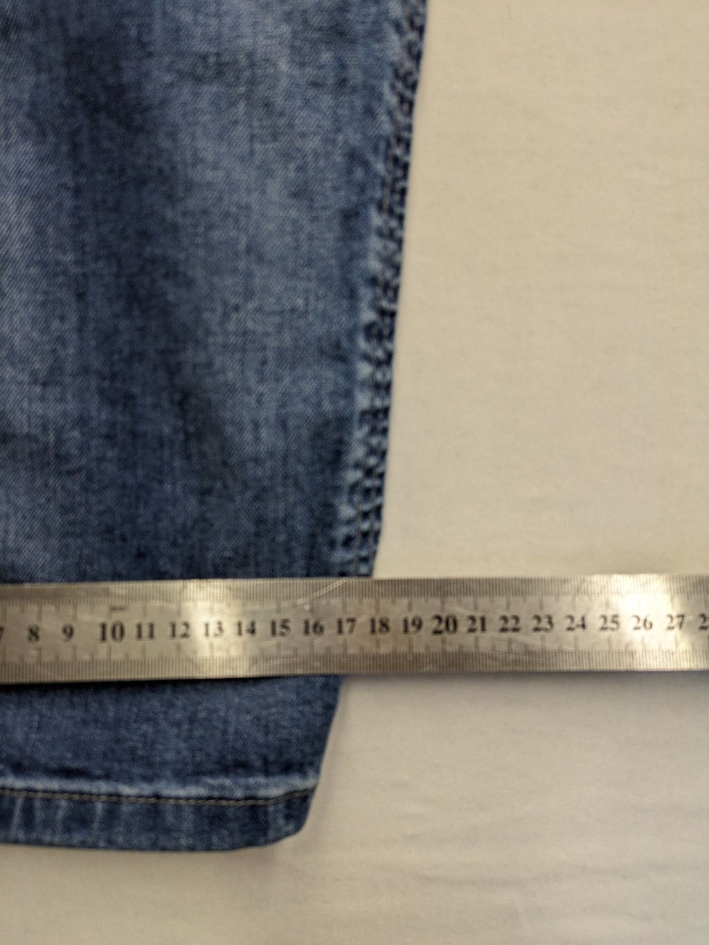 Brandit blue straight jeans with distressed details, button fly, and classic 5-pocket style.