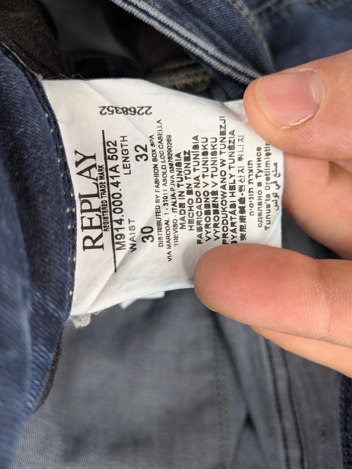 Replay slim fit jeans blue with subtle fading and stretch denim material.