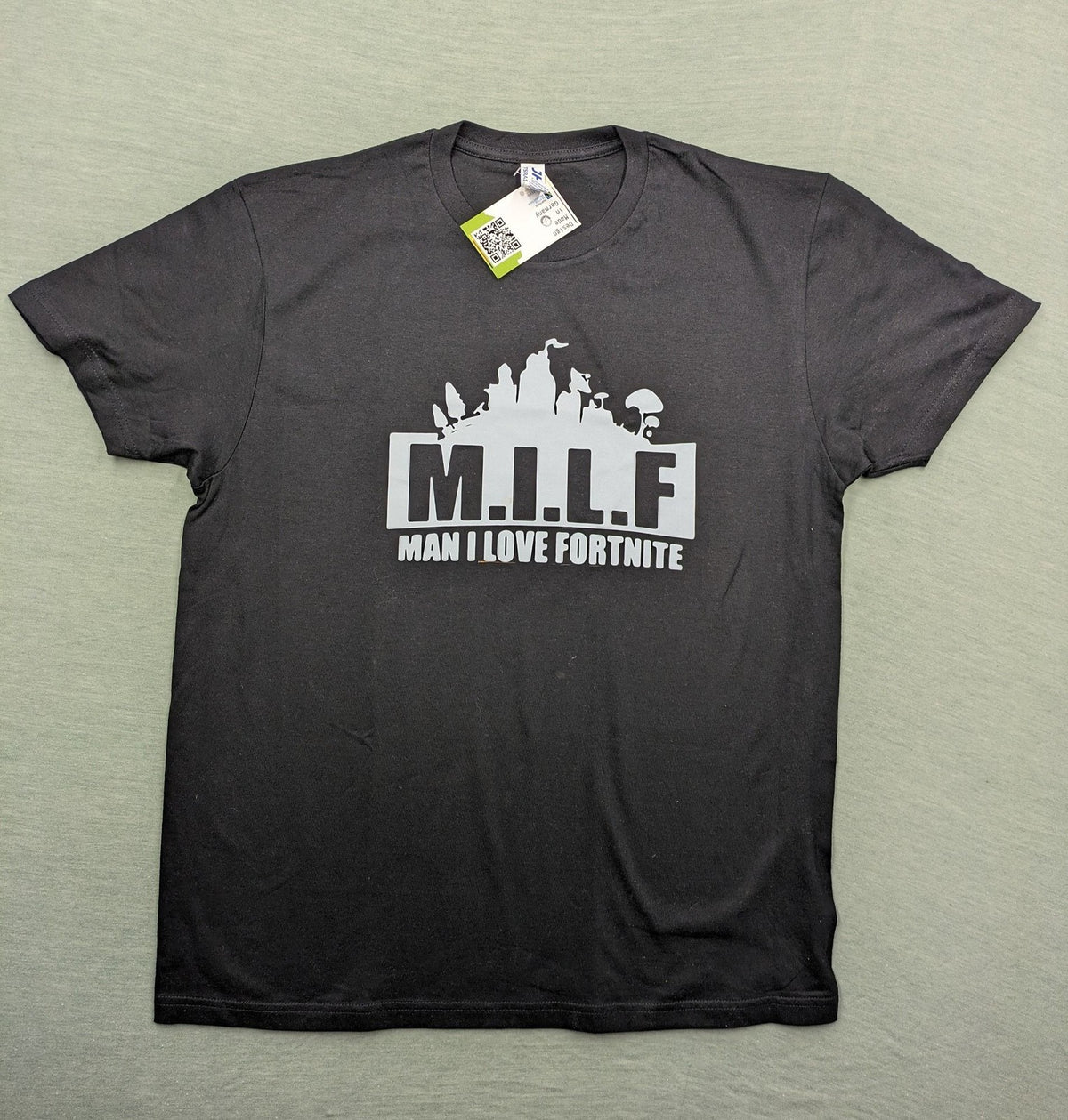 Fortnite black t-shirt with white "M.I.L.F. Man I Love Fortnite" graphic print.