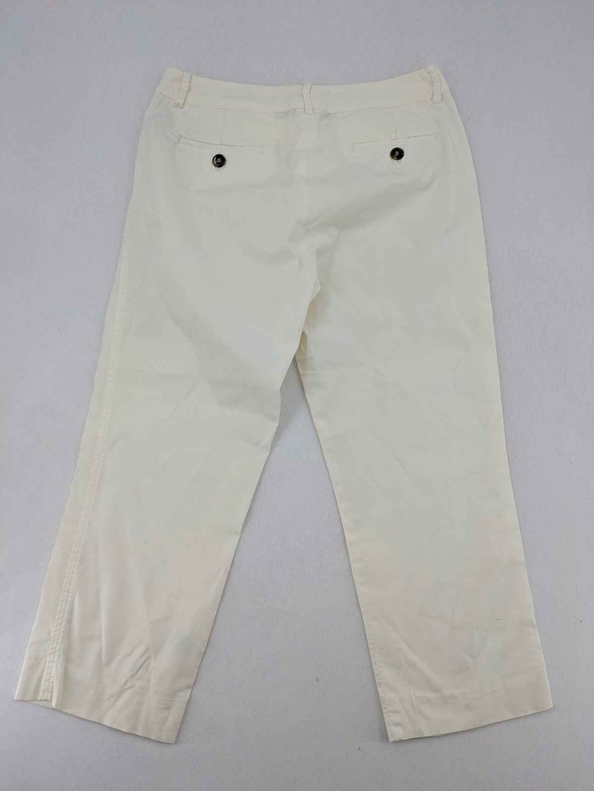 MaxMara cream cropped chino pants with zipper closure, belt loops, and back pockets.