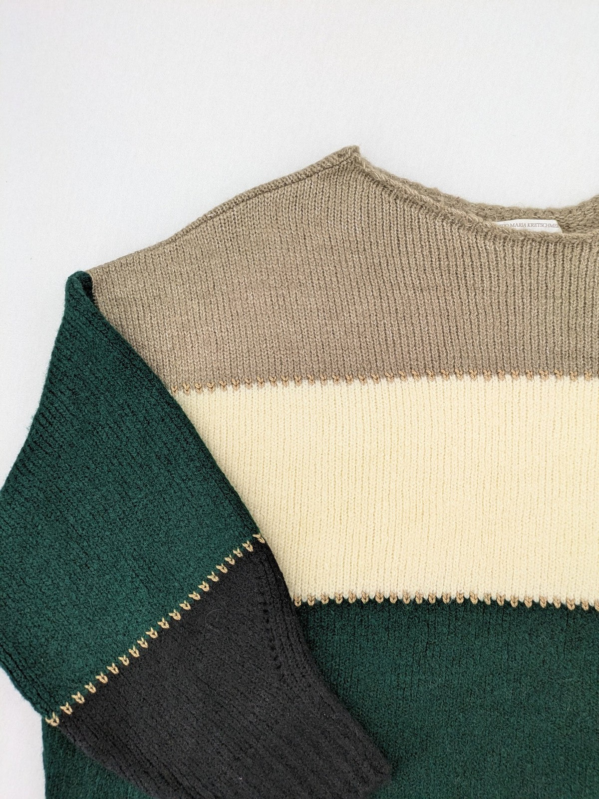 Guido Maria Kretschmer multi turtle neck jumper colorblock design with bold horizontal stripes.