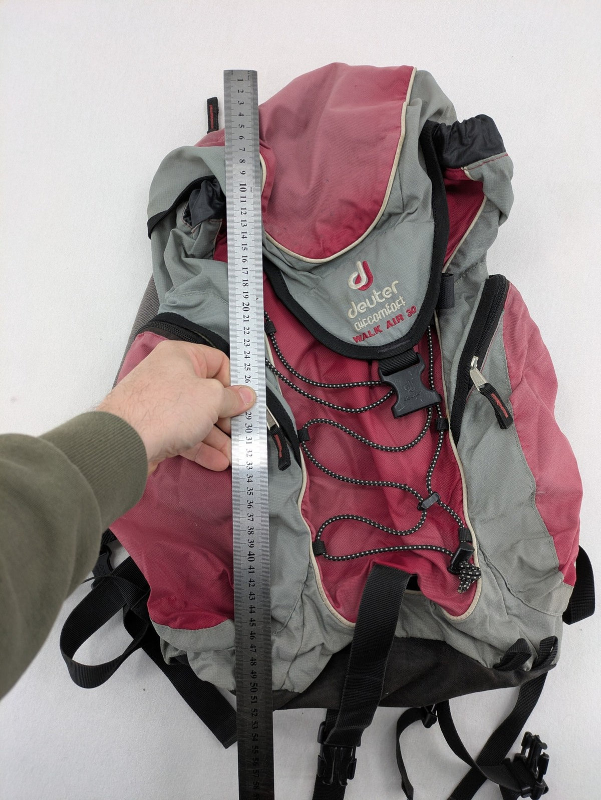 Deuter grey and pink Aircomfort Walk Air 30 rucksack with mesh back system.