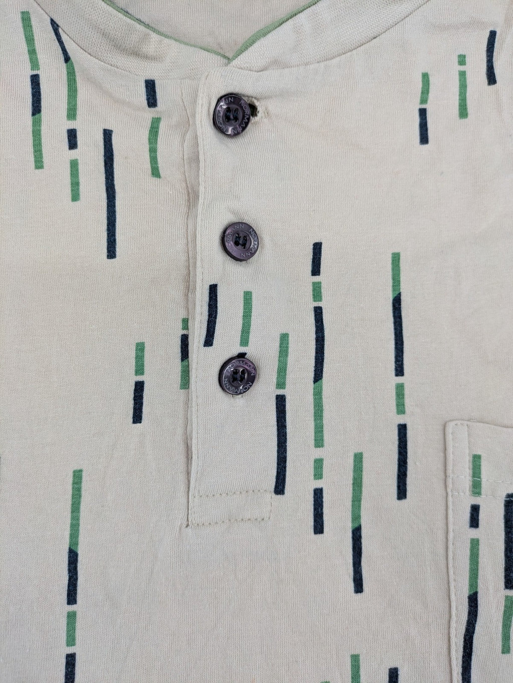 Normann beige striped long sleeve Henley shirt with button placket and chest pocket.